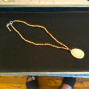 Beaded carved stone necklace